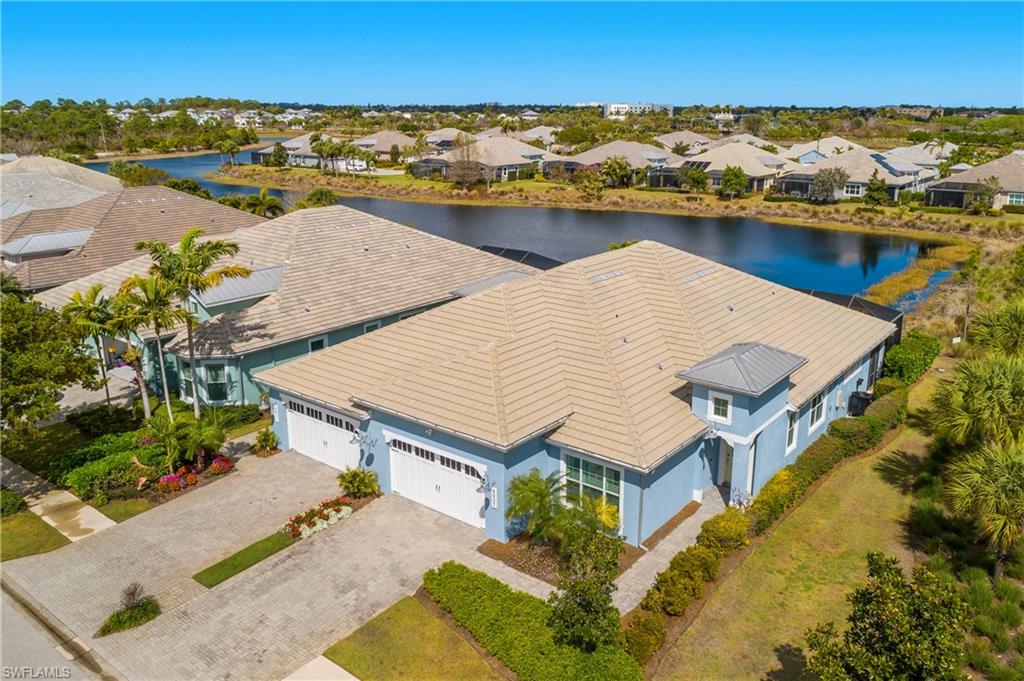 6907 Cay Court Naples, FL 34113 - Photo 38 of 50 Aerial view of the home.