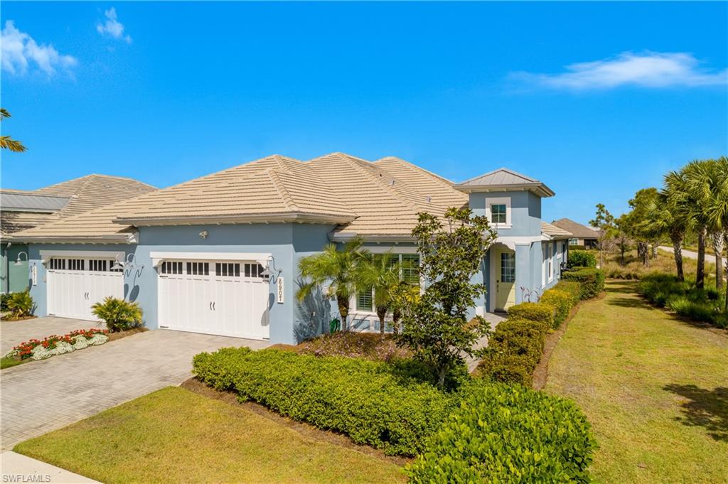 6907 Cay Court Naples, FL 34113 - Photo 39 of 50 Lots of green space here.