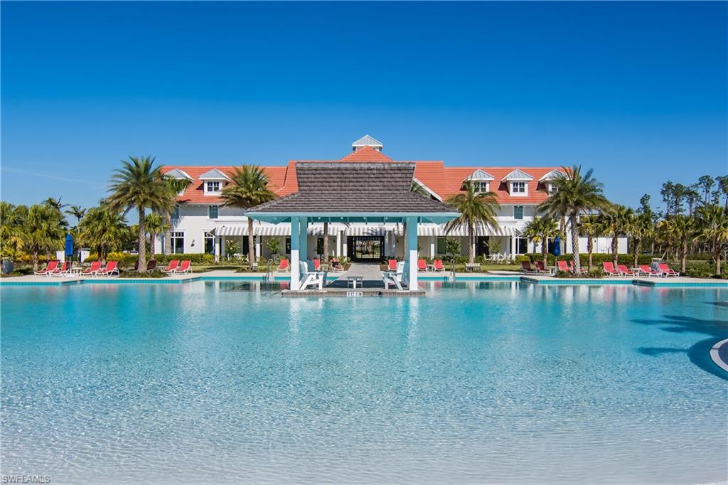 6907 Cay Court Naples, FL 34113 - Photo 41 of 50 Community pool featuring a gazebo and a patio