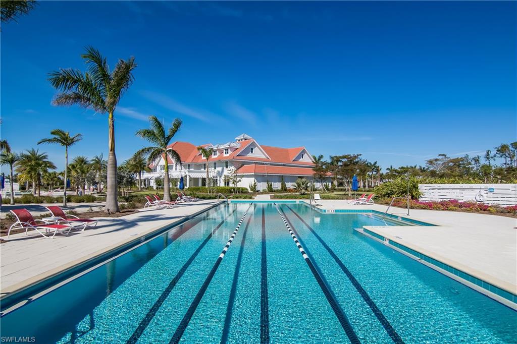 6907 Cay Court Naples, FL 34113 - Photo 45 of 50 Lap pool with lots of decking.