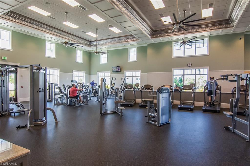 6907 Cay Court Naples, FL 34113 - Photo 46 of 50 Exercise room features free weights, and every machine you could ever need.