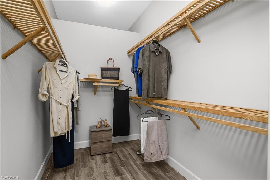 6907 Cay Court Naples, FL 34113 - Photo 10 of 50 Walk in closet featuring loads of space.