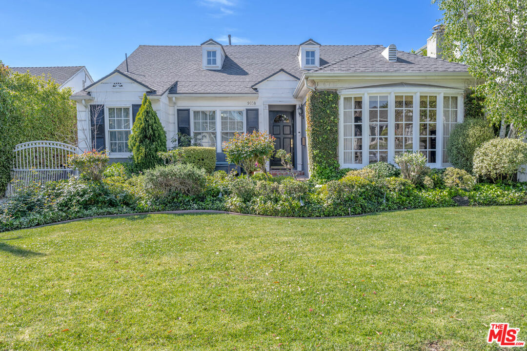9038 Cresta Drive Los Angeles, CA 90035 - Photo 1 of 23 a front view of a house with garden