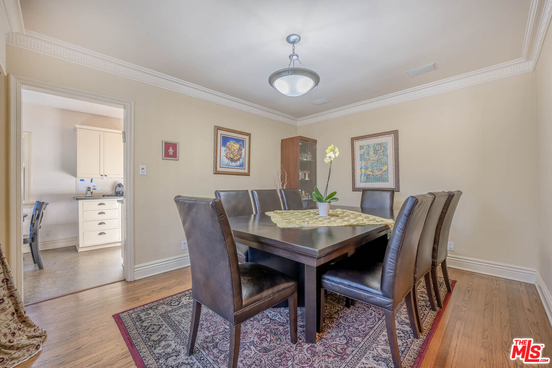 9038 Cresta Drive Los Angeles, CA 90035 - Photo 4 of 23 a view of a dining room with furniture