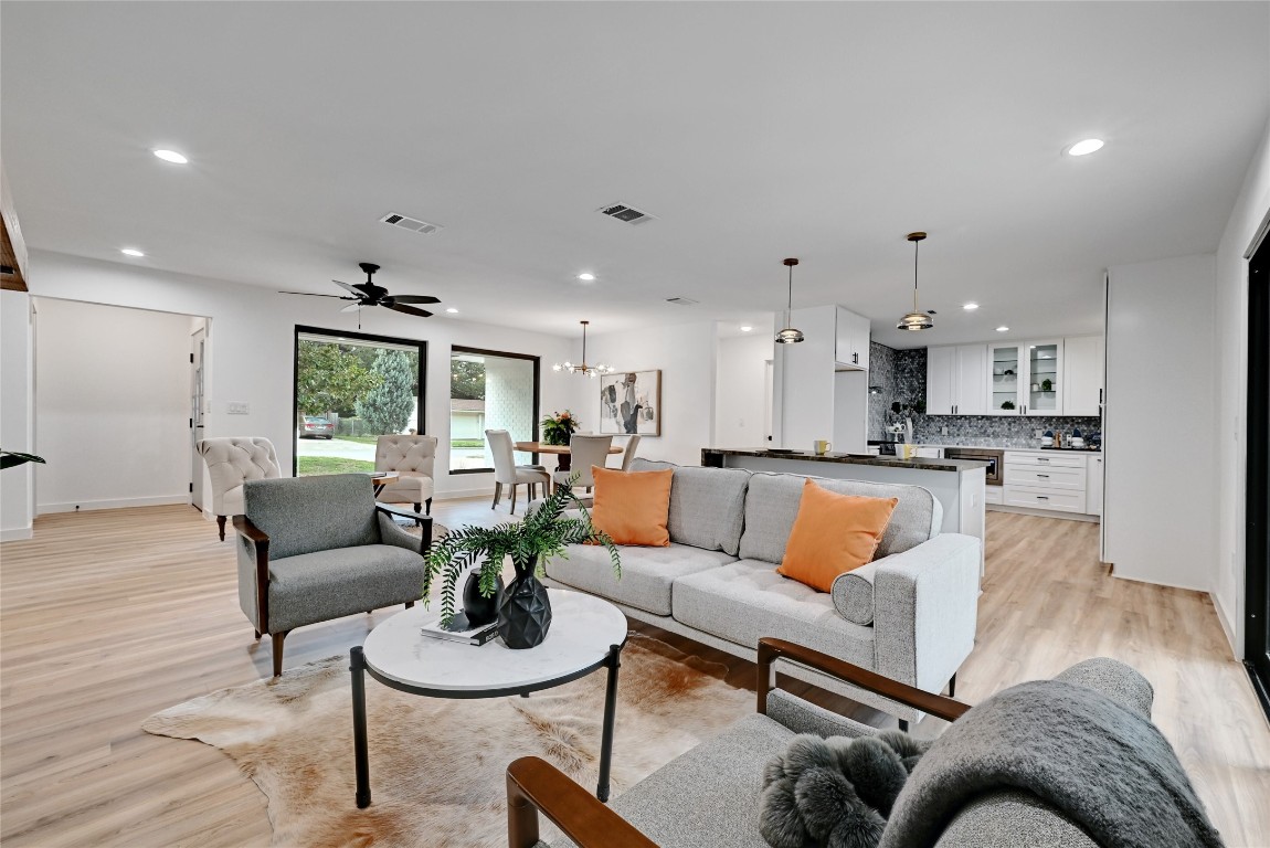4604 Nevada Path Austin, TX 78745 - Photo 2 of 10 a living room with furniture and kitchen view
