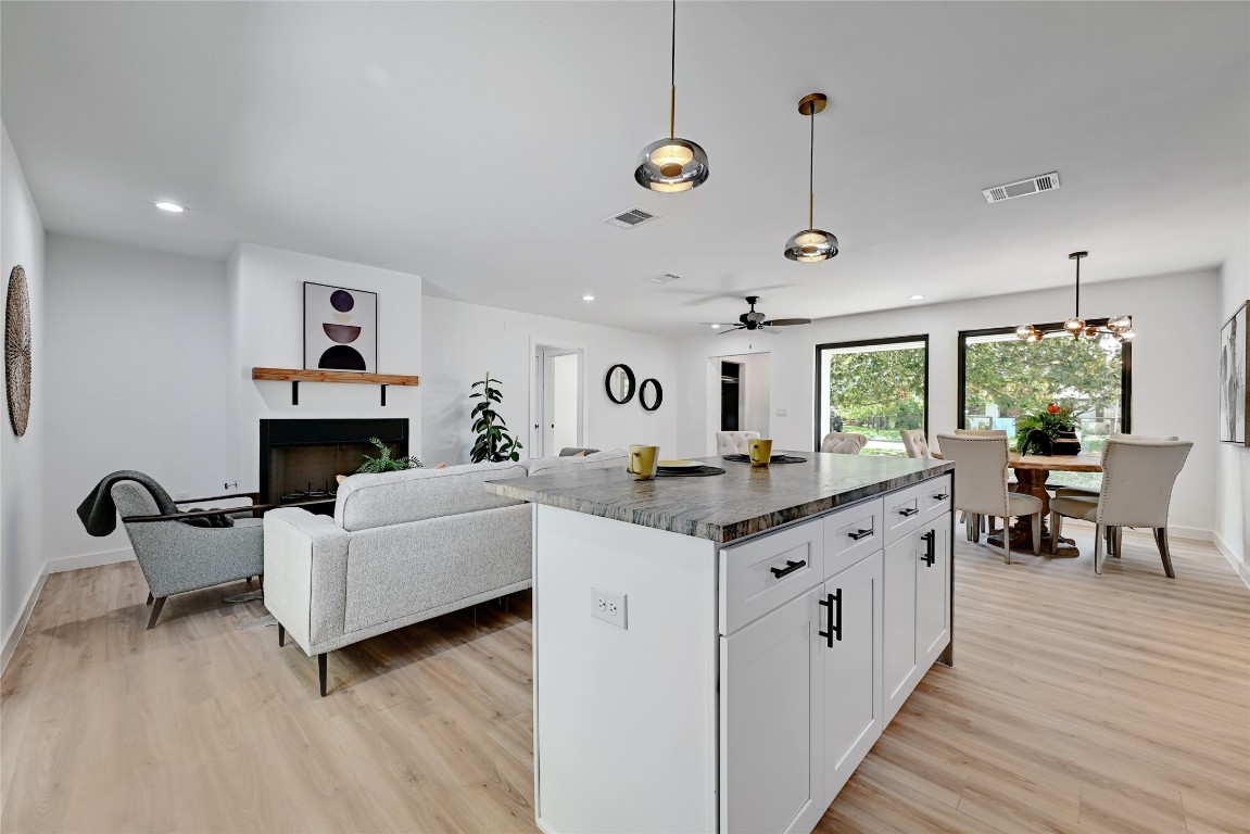 4604 Nevada Path Austin, TX 78745 - Photo 3 of 10 a large white kitchen with a large window