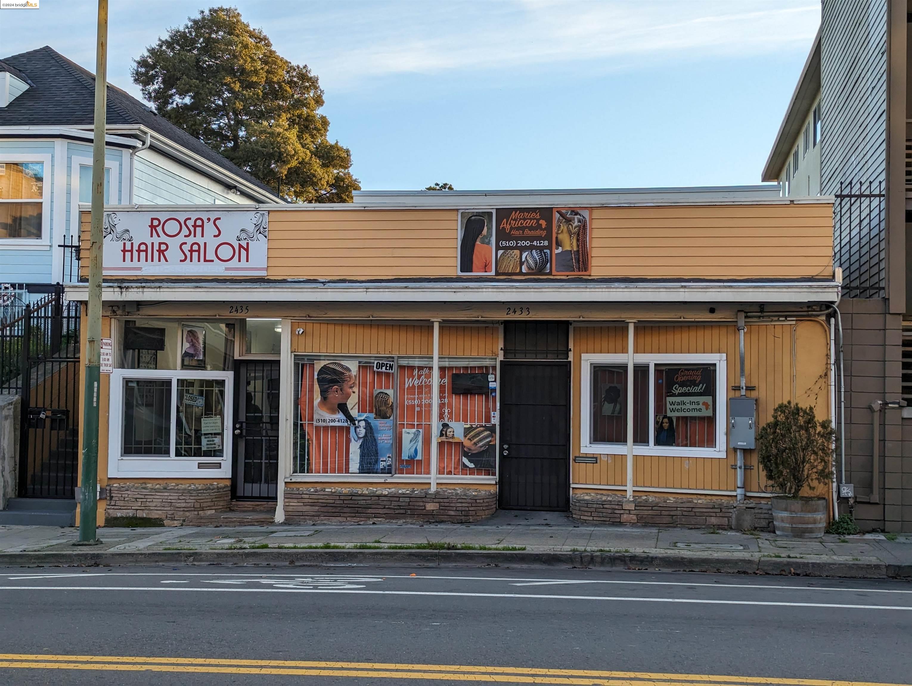 a view of a brick building with large windows