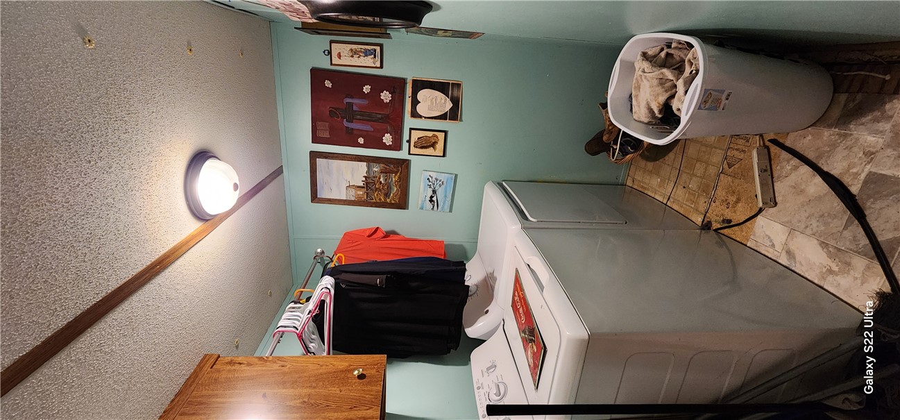 326 Doyle Street Westminster, SC 29693 - Photo 15 of 26 This dedicated utility space offers convenient laundry facilities and practical storage solutions.