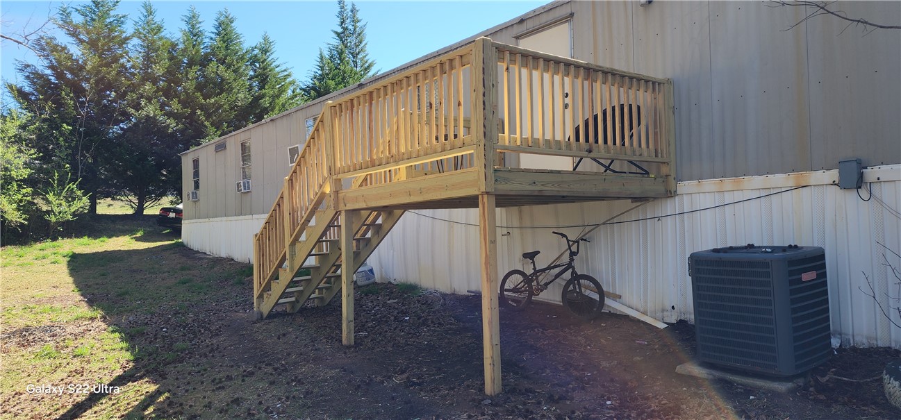326 Doyle Street Westminster, SC 29693 - Photo 22 of 26 This residence features a freshly built wooden deck, ideal for outdoor enjoyment and entertaining.