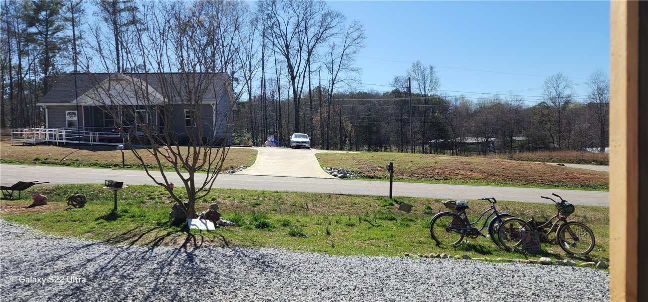 326 Doyle Street Westminster, SC 29693 - Photo 26 of 26 This charming home features a lovely front porch and a convenient ramp for accessibility.