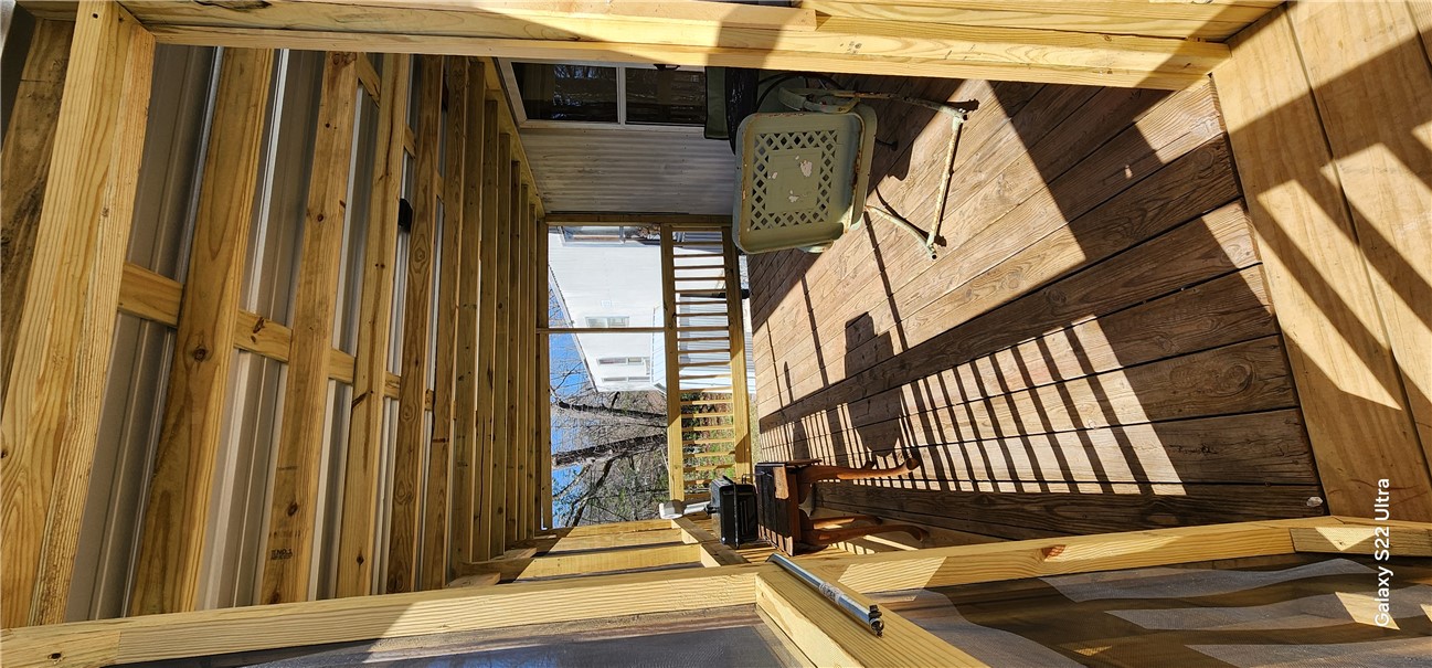 326 Doyle Street Westminster, SC 29693 - Photo 5 of 26 This spacious wooden deck offers an inviting outdoor living area for relaxation.