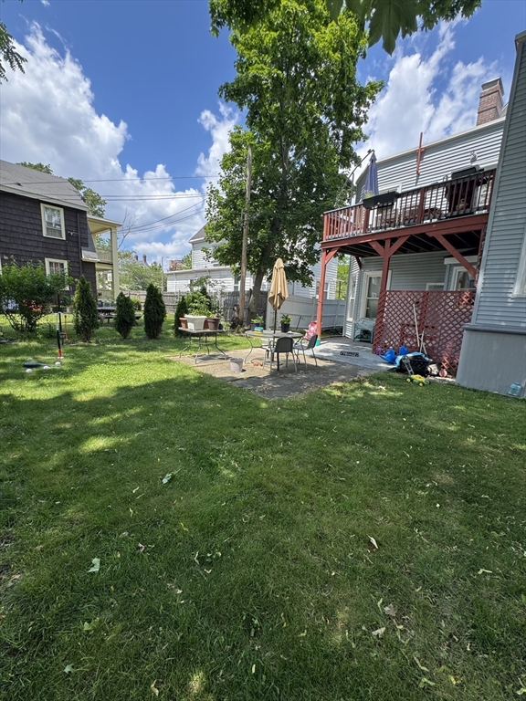 5 Spring Park Avenue, Unit 1 Boston, MA 02130 - Photo 22 of 24 a view of a house with a yard and sitting area