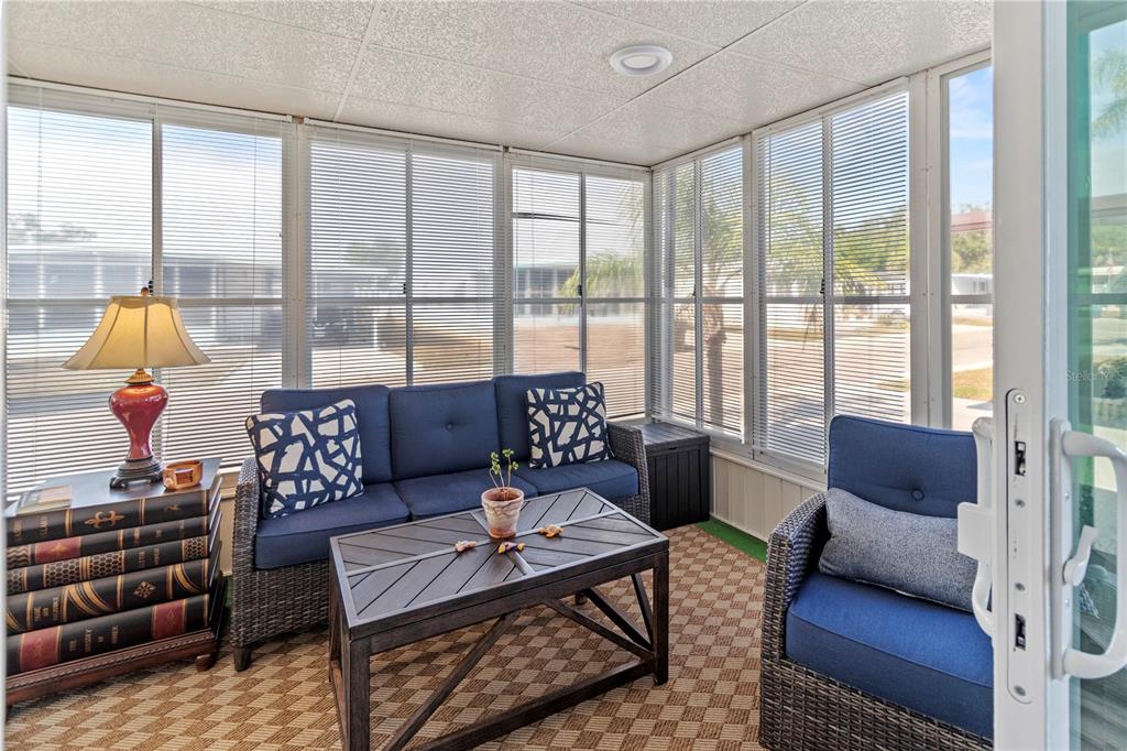 5619 Bayshore Road, Unit 240 Palmetto, FL 34221 - Photo 19 of 33 a living room with furniture and a large window