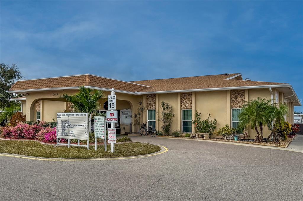 5619 Bayshore Road, Unit 240 Palmetto, FL 34221 - Photo 32 of 33 front view of a house with a yard