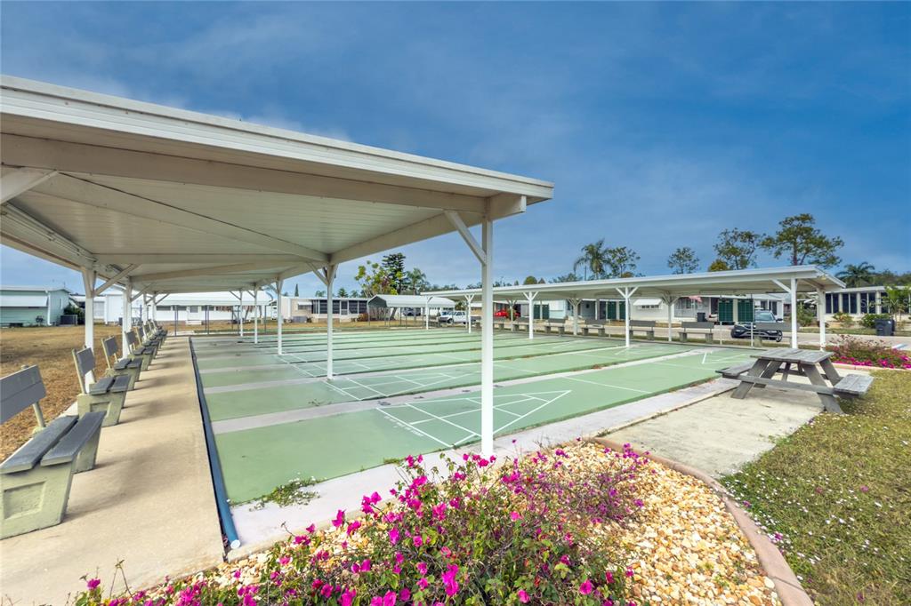5619 Bayshore Road, Unit 240 Palmetto, FL 34221 - Photo 33 of 33 a view of house with outdoor space patio and swimming pool