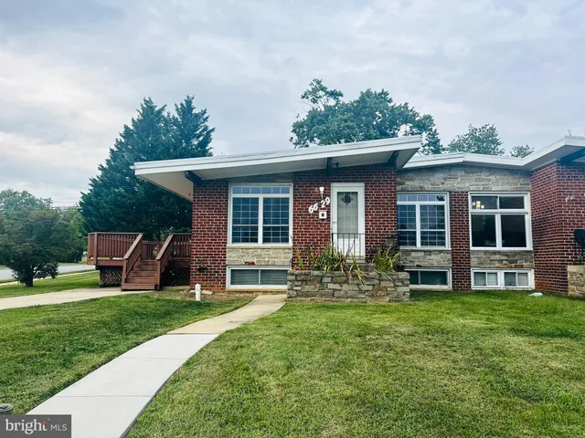 a house view with a garden space