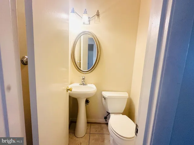 a bathroom with a bathtub and window
