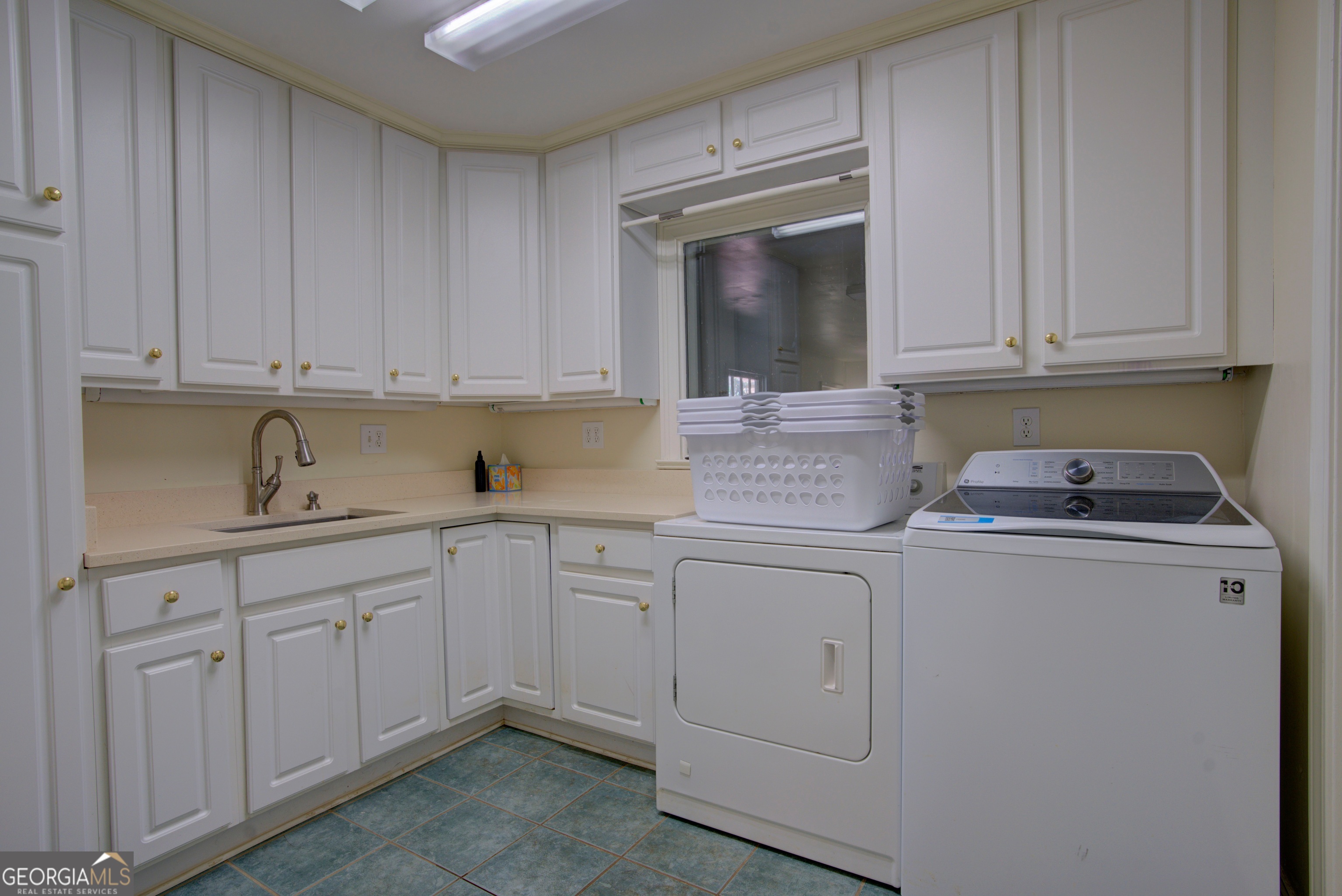 7 Pine Valley Road Rome, GA 30165 - Photo 44 of 57 a kitchen with granite countertop white cabinets and sink