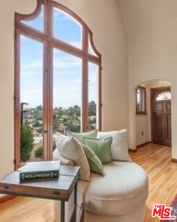1411 Columbia Drive Glendale, CA 91205 - Photo 11 of 45 a living room with furniture and a floor to ceiling window