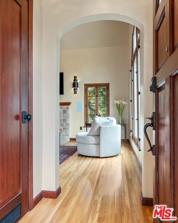 1411 Columbia Drive Glendale, CA 91205 - Photo 12 of 45 a living room with furniture and a wooden floor