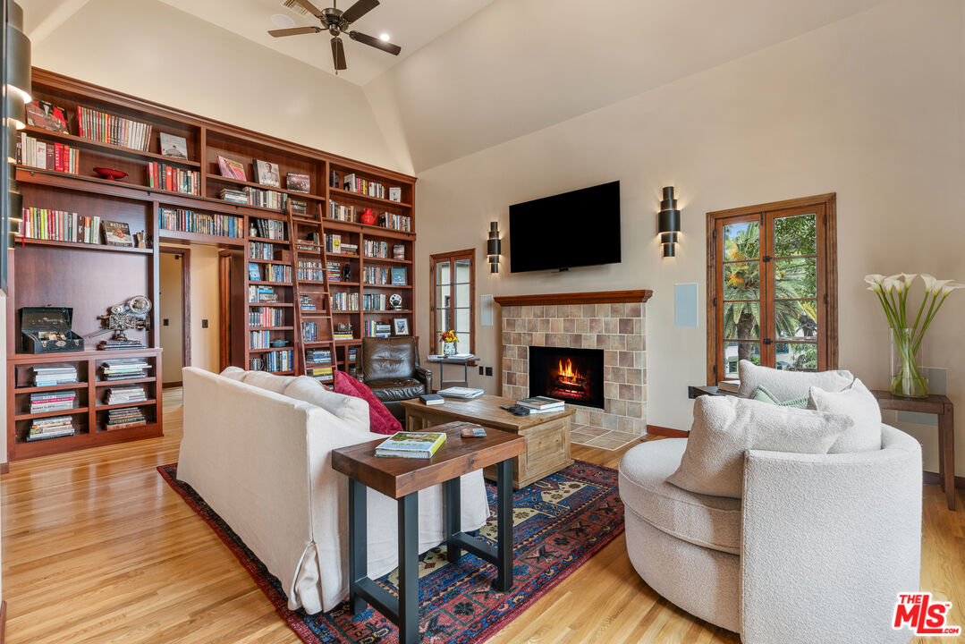 1411 Columbia Drive Glendale, CA 91205 - Photo 13 of 45 a living room with fireplace furniture and a flat screen tv