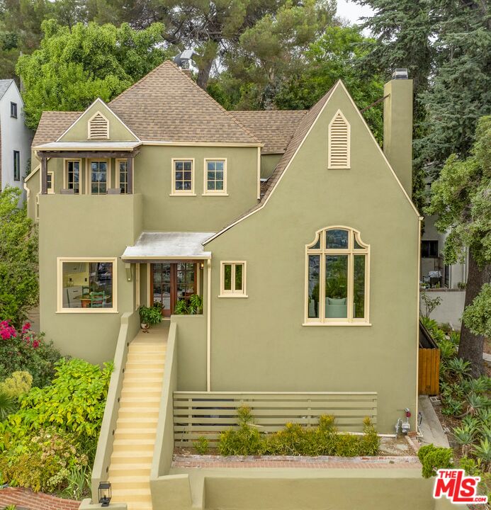 1411 Columbia Drive Glendale, CA 91205 - Photo 2 of 45 a front view of a house with a yard