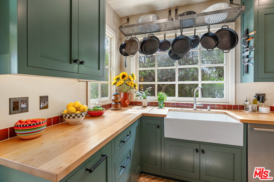 1411 Columbia Drive Glendale, CA 91205 - Photo 22 of 45 a kitchen with a sink and cabinets