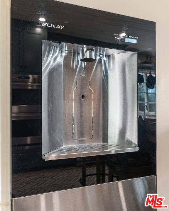 1411 Columbia Drive Glendale, CA 91205 - Photo 25 of 45 a bathroom with a mirror and a shower