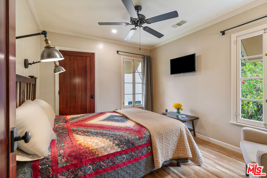 1411 Columbia Drive Glendale, CA 91205 - Photo 35 of 45 a bedroom with a bed and a window