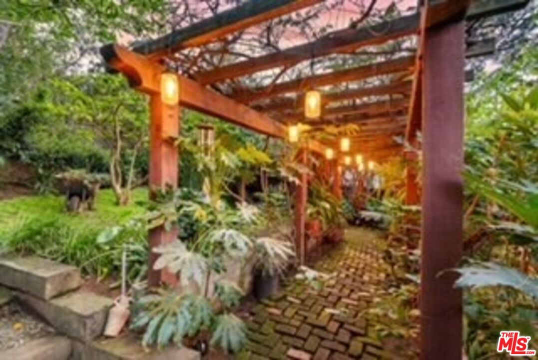 1411 Columbia Drive Glendale, CA 91205 - Photo 38 of 45 a backyard of a house with lots of green space