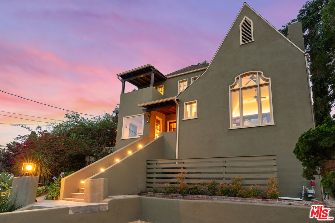 1411 Columbia Drive Glendale, CA 91205 - Photo 5 of 45 a front view of a house with a yard