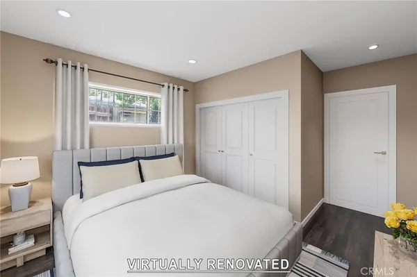 a large white bed in a white room