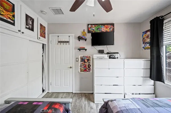 a view of a bedroom with baby toys