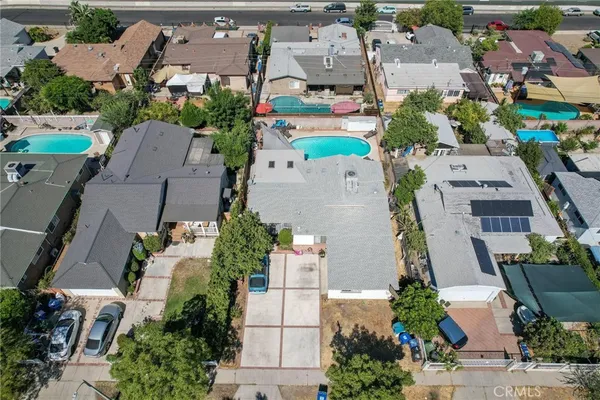an aerial view of residential house with outdoor space