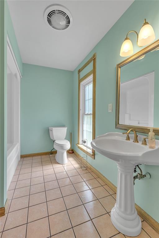188 Logtown Road Darlington, PA 16115 - Photo 18 of 36 a bathroom with a sink a toilet and mirror