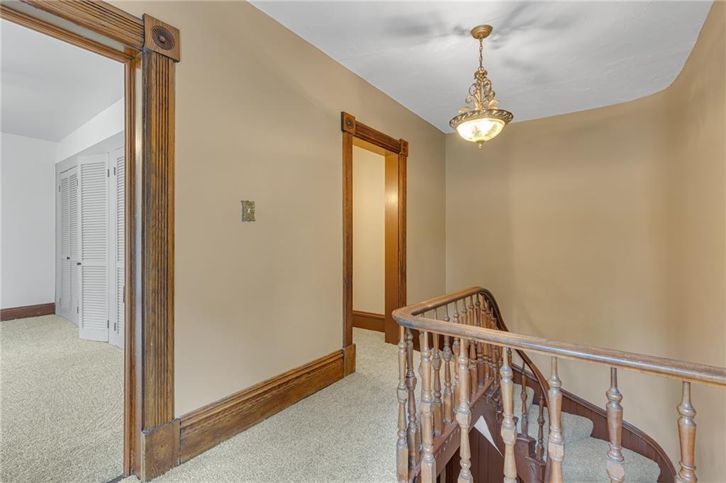 188 Logtown Road Darlington, PA 16115 - Photo 23 of 36 a view of a hallway with wooden floor and staircase