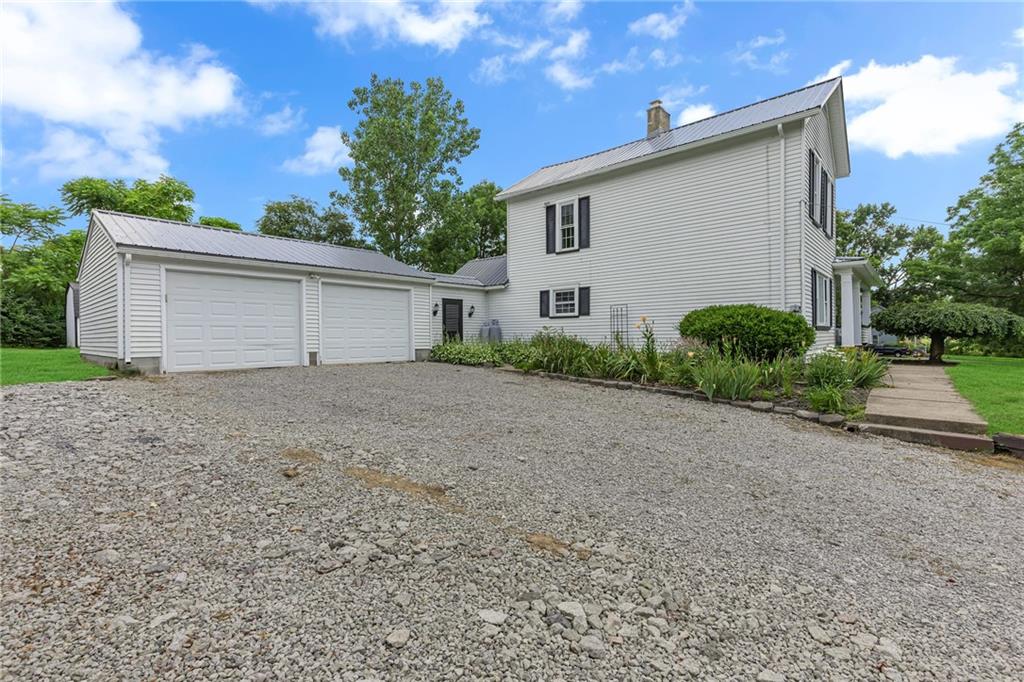 188 Logtown Road Darlington, PA 16115 - Photo 34 of 36 a view of a house with a backyard