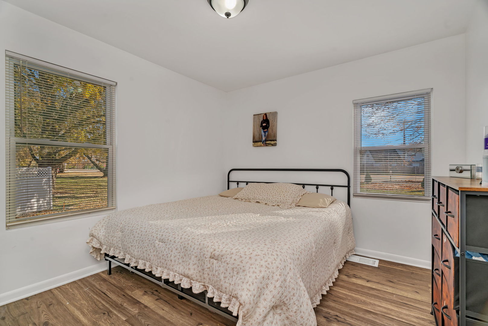 24646 West Eames Street Channahon, IL 60410 - Photo 14 of 32 a bed sitting in a bedroom next to a window