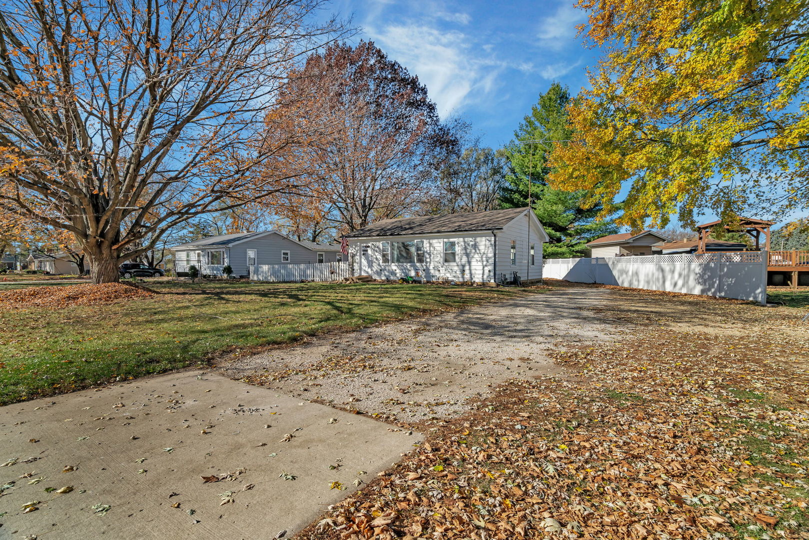 24646 West Eames Street Channahon, IL 60410 - Photo 3 of 32 a view of a yard with a house and a large tree
