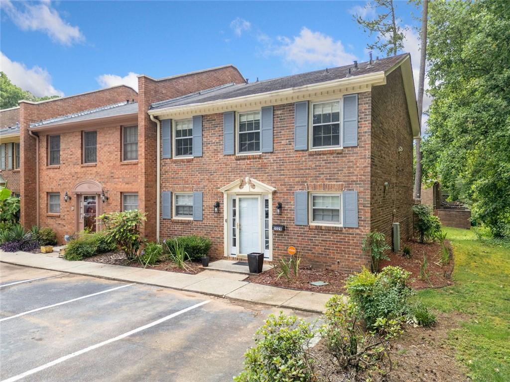 3329 York Place Decatur, GA 30032 - Photo 1 of 1 a front view of a house with yard and trees around