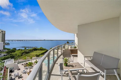 a view of balcony with furniture