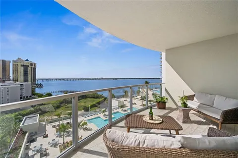 a view of swimming pool from a balcony