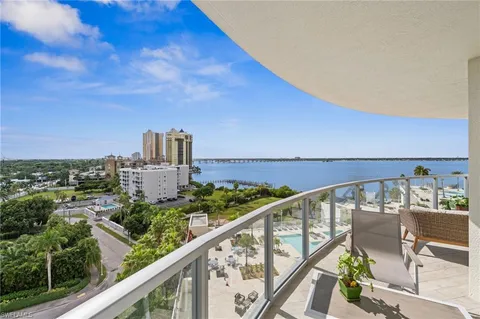a view of a balcony with city view