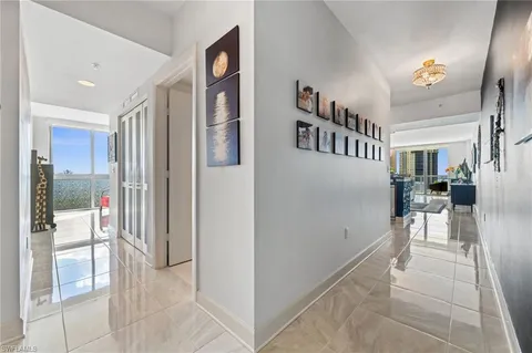 a view of livingroom with furniture and floor to ceiling window