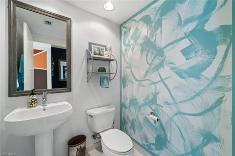 a view of a livingroom with furniture and front door