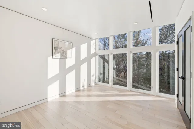 a bathroom with a double vanity sink mirror and shower