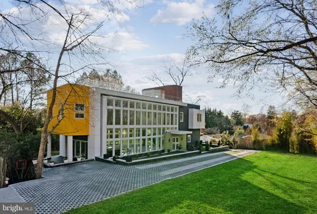 a view of building with a garden