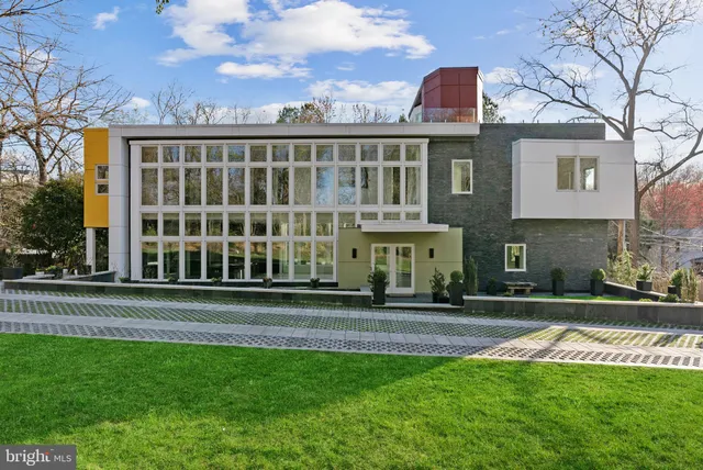 a view of a building with a yard