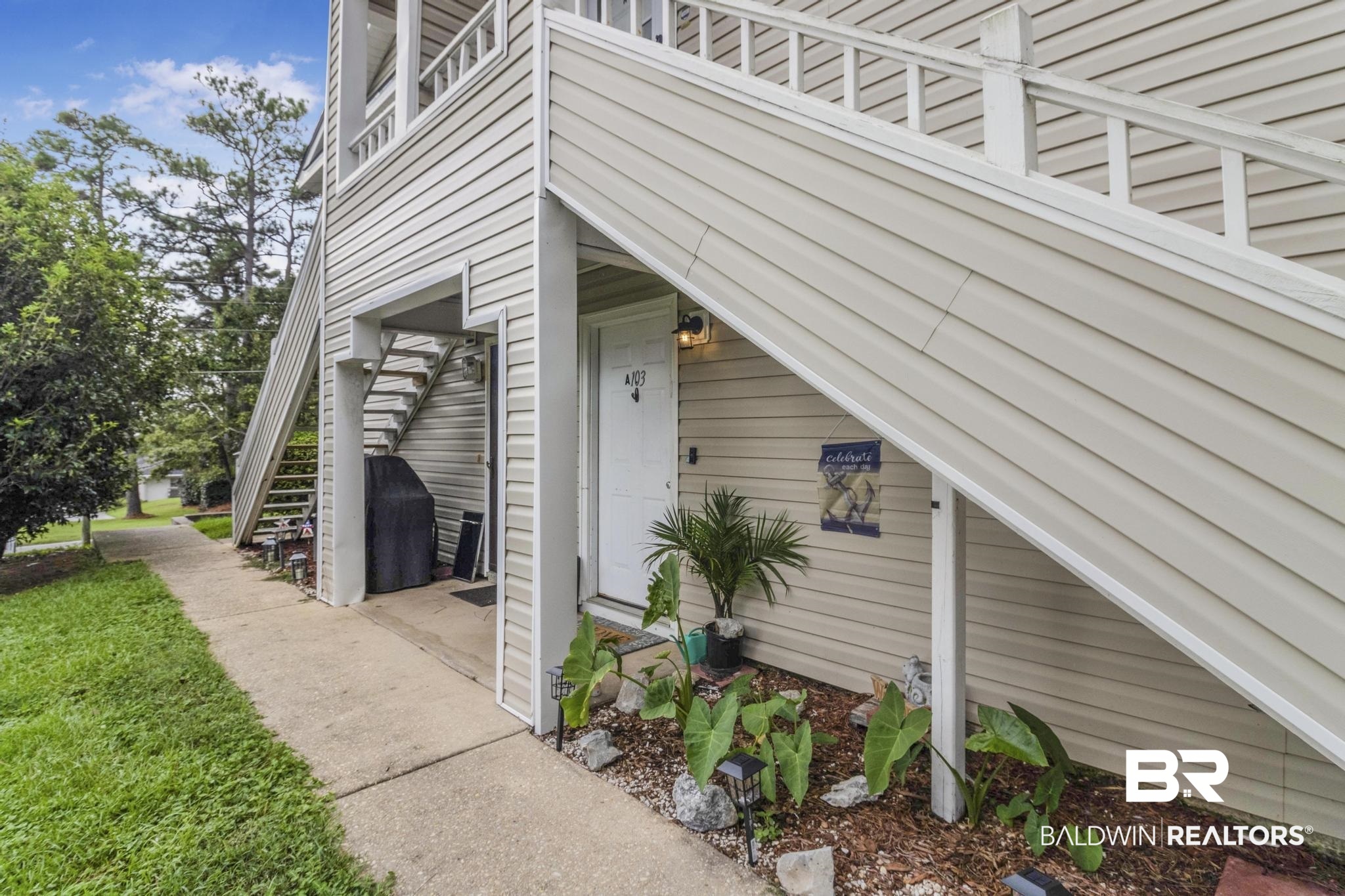 110 5th Street, Unit A 103 Daphne, AL 36526 - Photo 27 of 28 View of home's exterior featuring a balcony