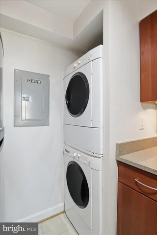 a kitchen that has a sink and a stove